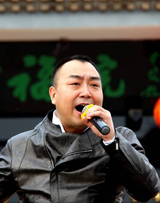 十三狼（中国内地作曲、作词兼演唱艺人，中国秦歌第一人）