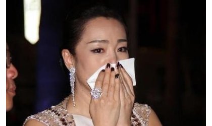 巩俐无法生育是什么原因？