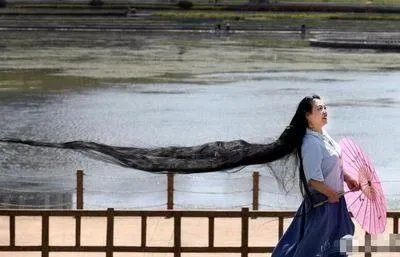 为什么女子留3米长发？