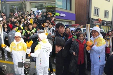成龙传递冬奥圣火 众人围观气氛热烈